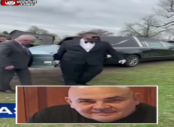Video :During the burial, a guy is stuck beneath his father's coffin as the grave falls